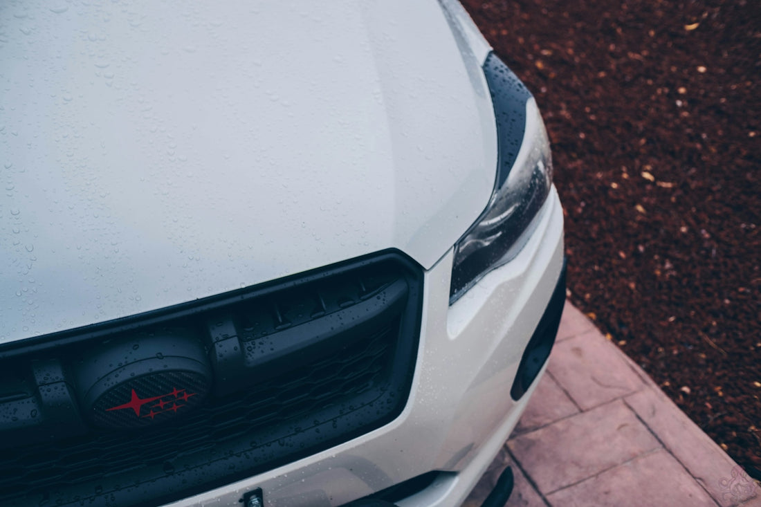 white car on brown brick floor