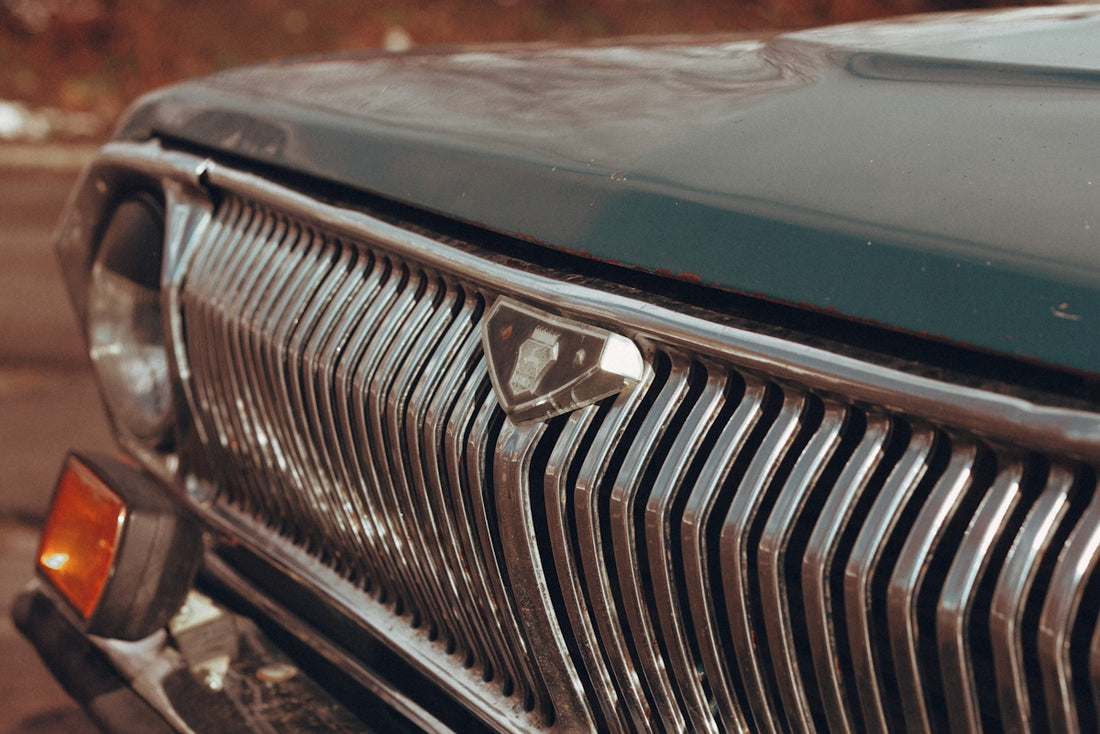 green and silver car grille