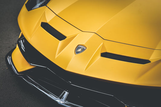 yellow ferrari car in close up photography