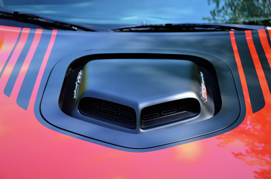 black and red car in close up photography