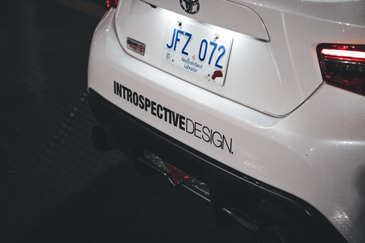 a close up of a car with a license plate