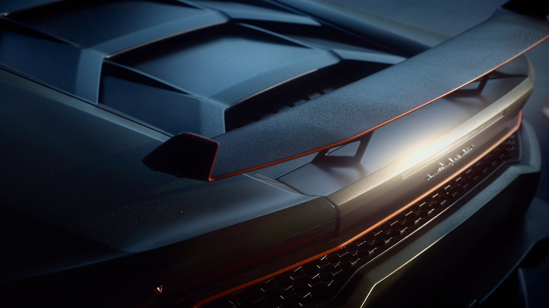 a close up of the hood of a sports car