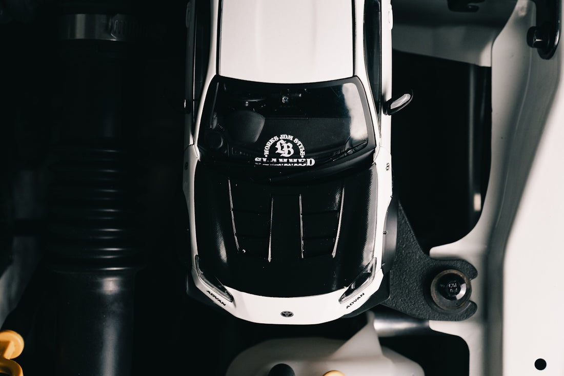 Top view of a white and black toy car